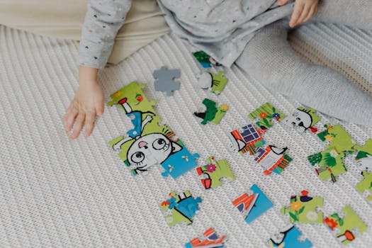 A child is playing with colorful puzzle pieces on a cozy indoor setting, encouraging cognitive development.